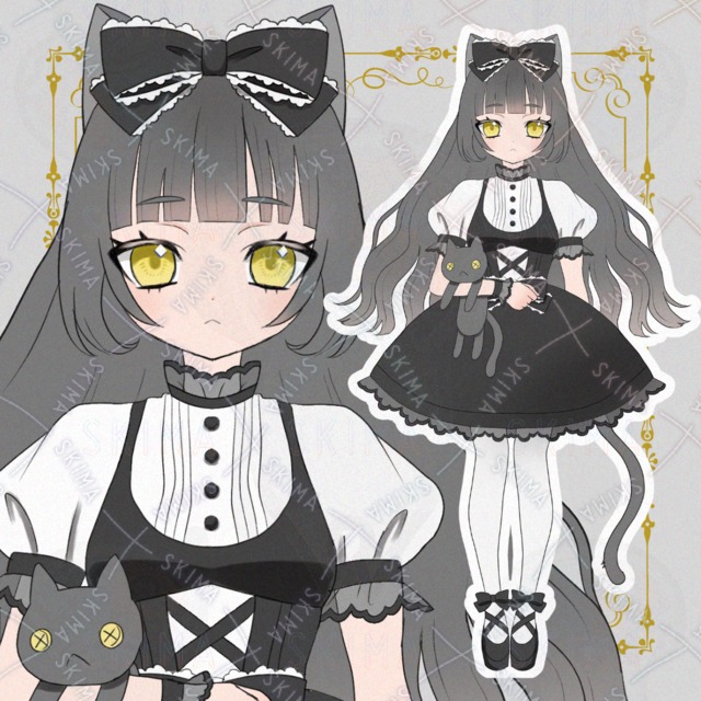 ぬいぐるみを抱いた黒猫ちゃん