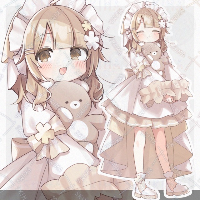 くまのぬいぐるみを抱えた女の子